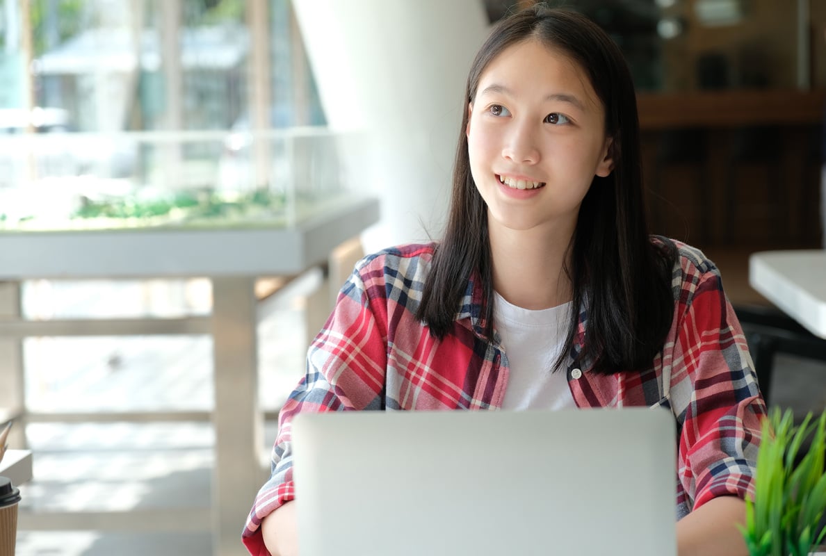 Student Studying with Computer